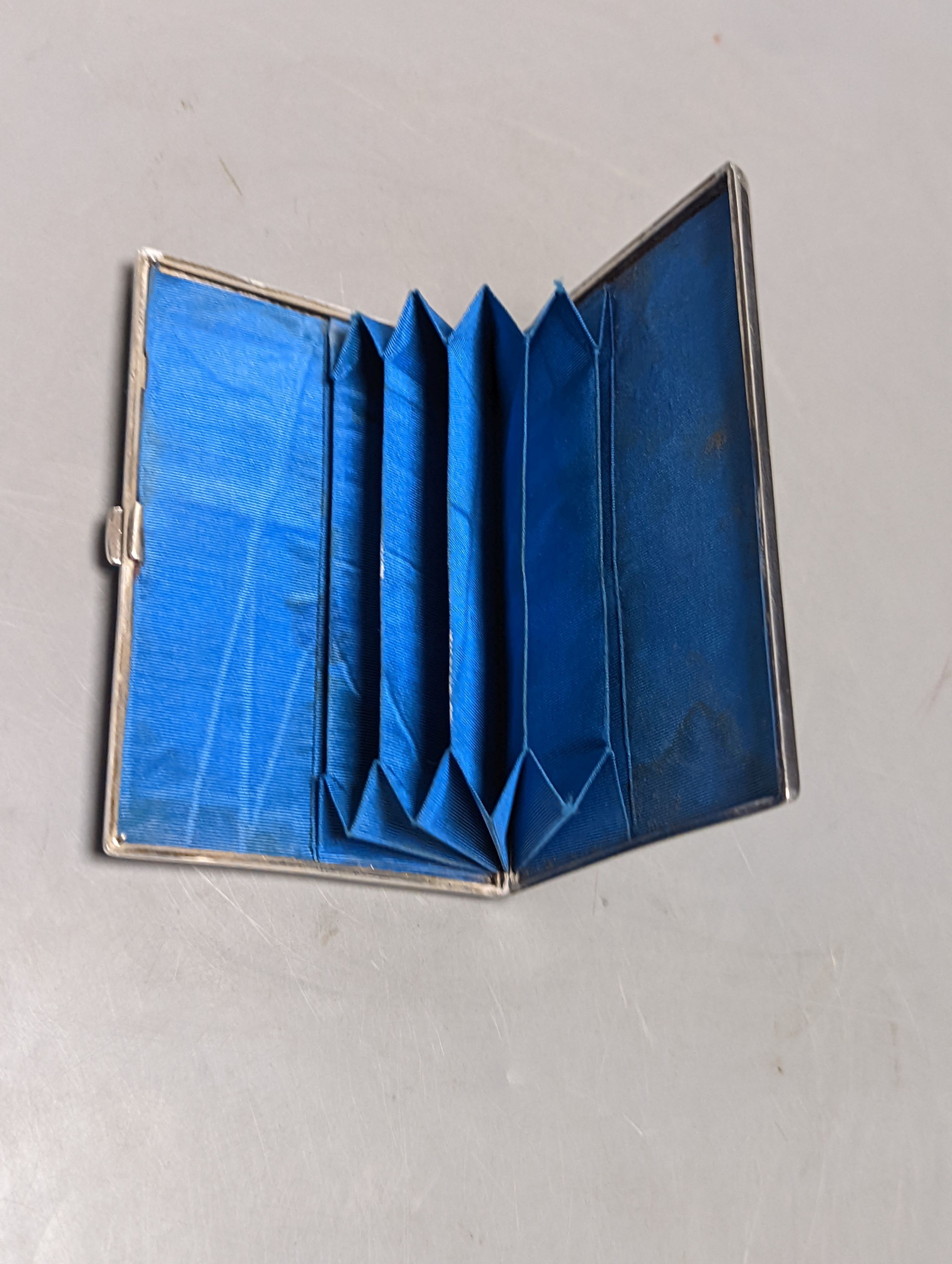 A Victorian silver card purse, with engraved chinoiserie decoration, Colen Hewer Cheshire, Birmingham, 1879, 10.1cm.